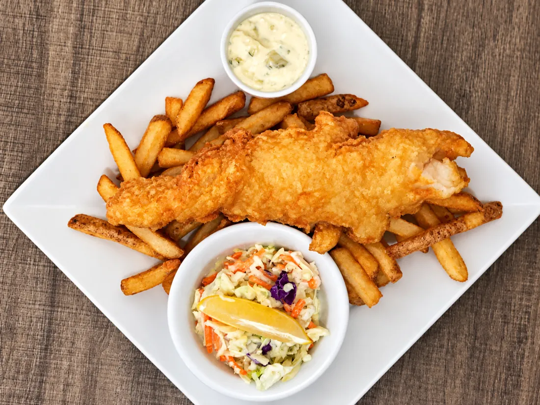 Fish and chips with coleslaw and tartar sauce