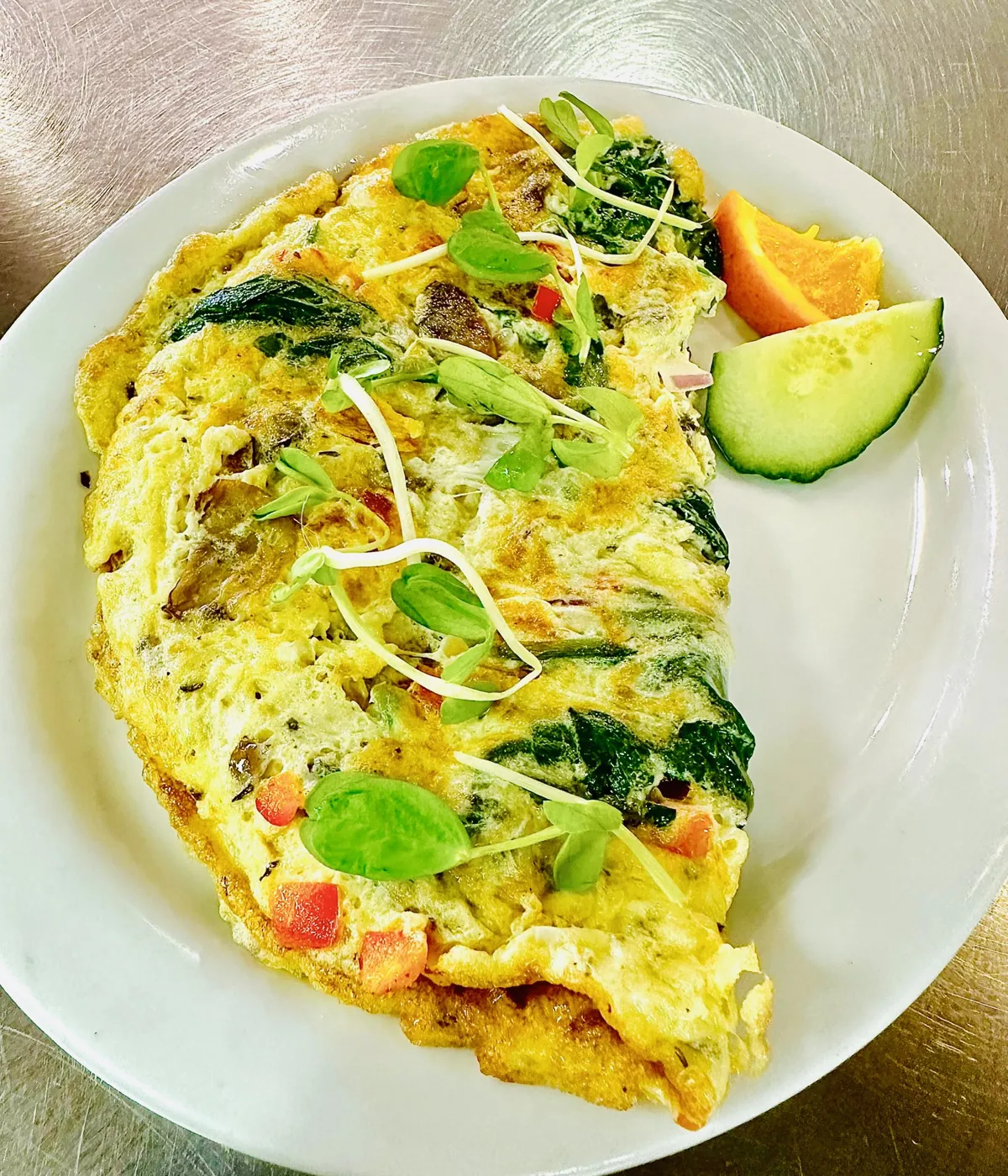 S.O.F.T. omelette with spinach, onion, feta and tomato